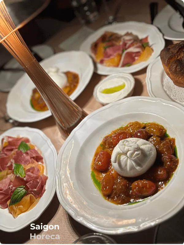 Fresh Burrata cheese salad with aged Prosciutto at Bambino