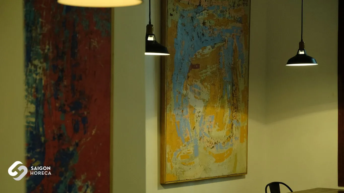 Curated Spanish art canvas details on the walls of Casa Maria