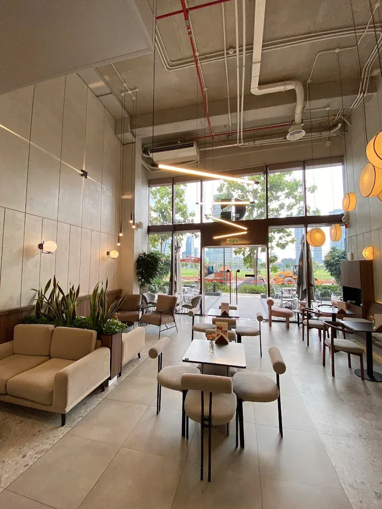 Modern interior space of G-Cup Coffee & Bistro at The Metropole Thu Thiem