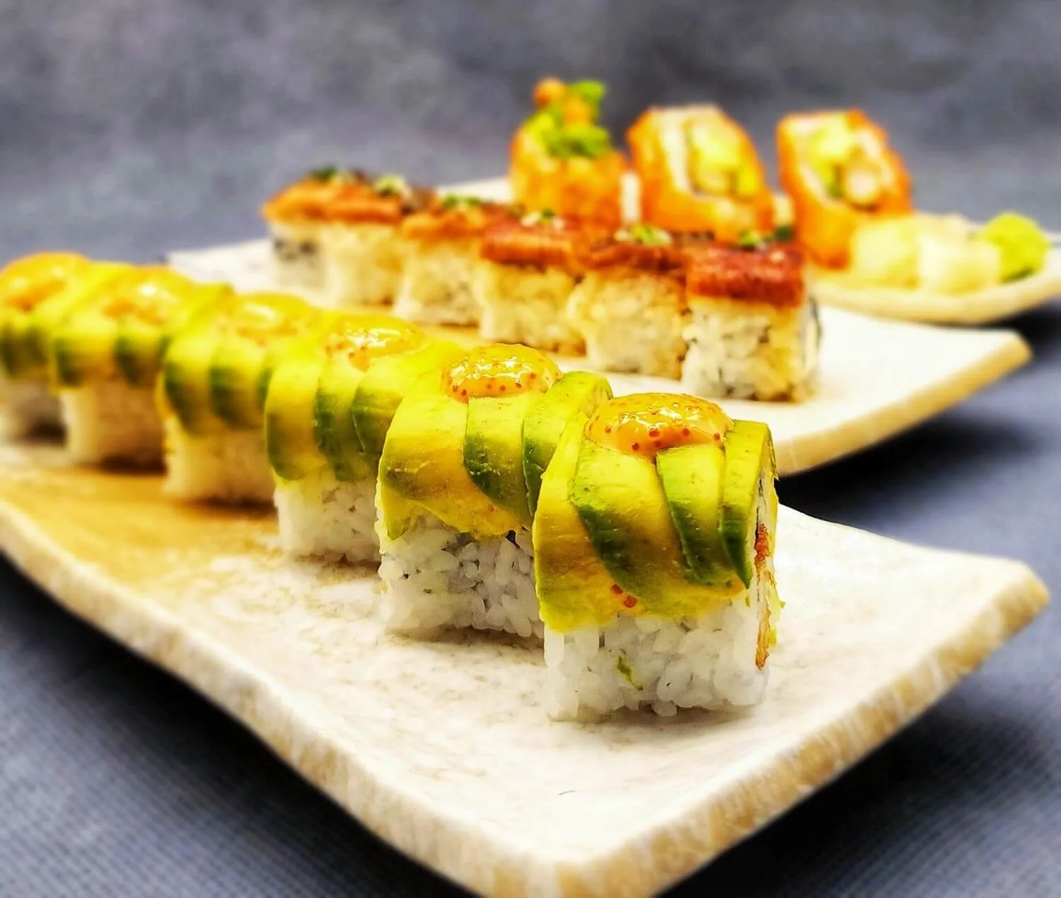 Platter of flame-torched avocado sushi roll at Heiwa Sushi - Saigon Horeca