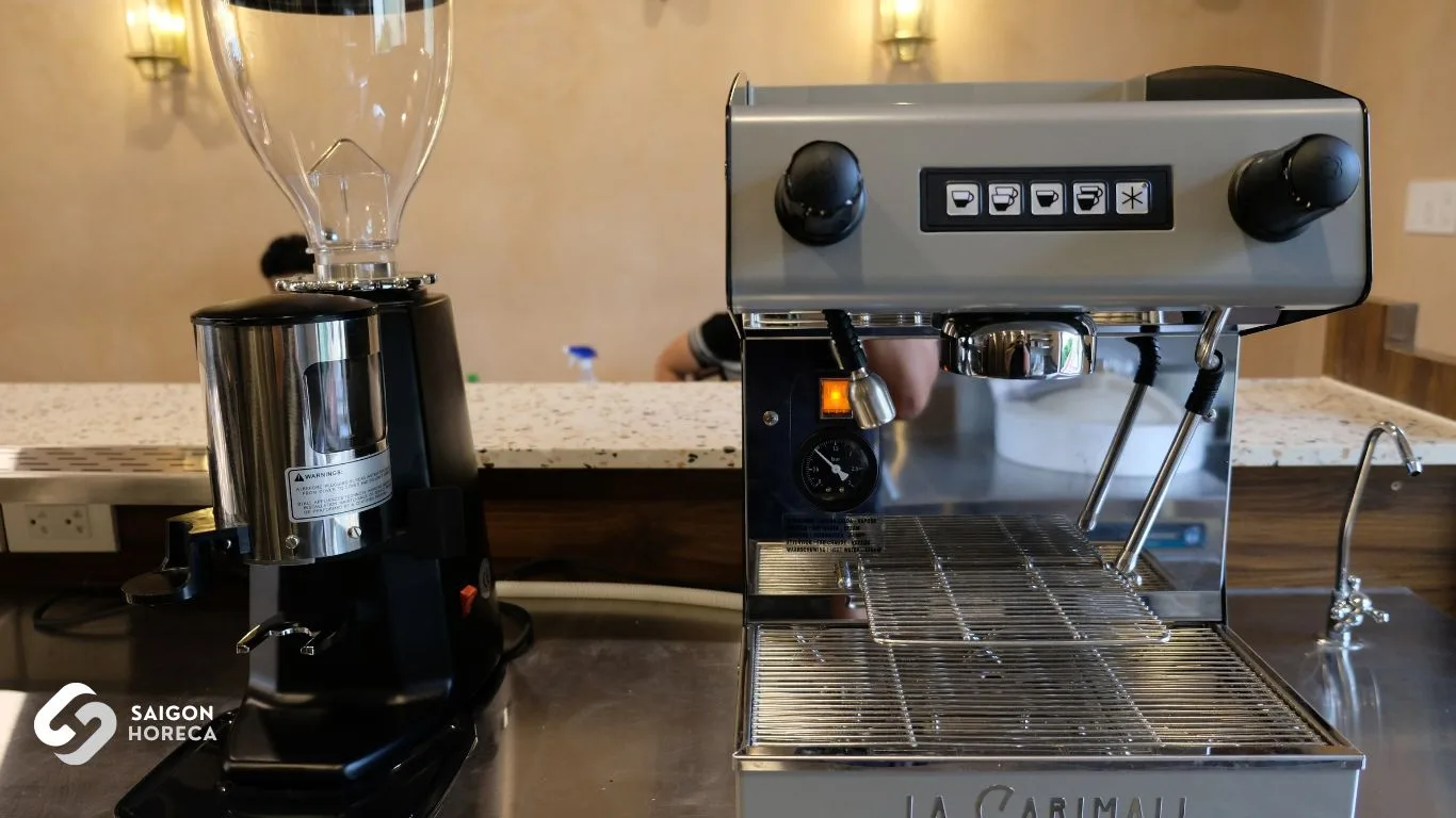 La Carimali commercial espresso machine and grinder suite—the vibrant heart of the Italian espresso bar