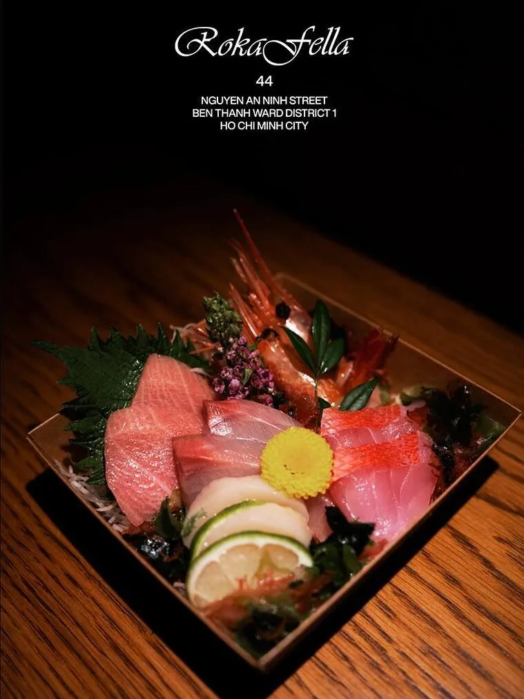 Assorted premium sashimi platter featuring Otoro tuna, Hamachi yellowtail, scallops, and sweet shrimp at Roka Fella.