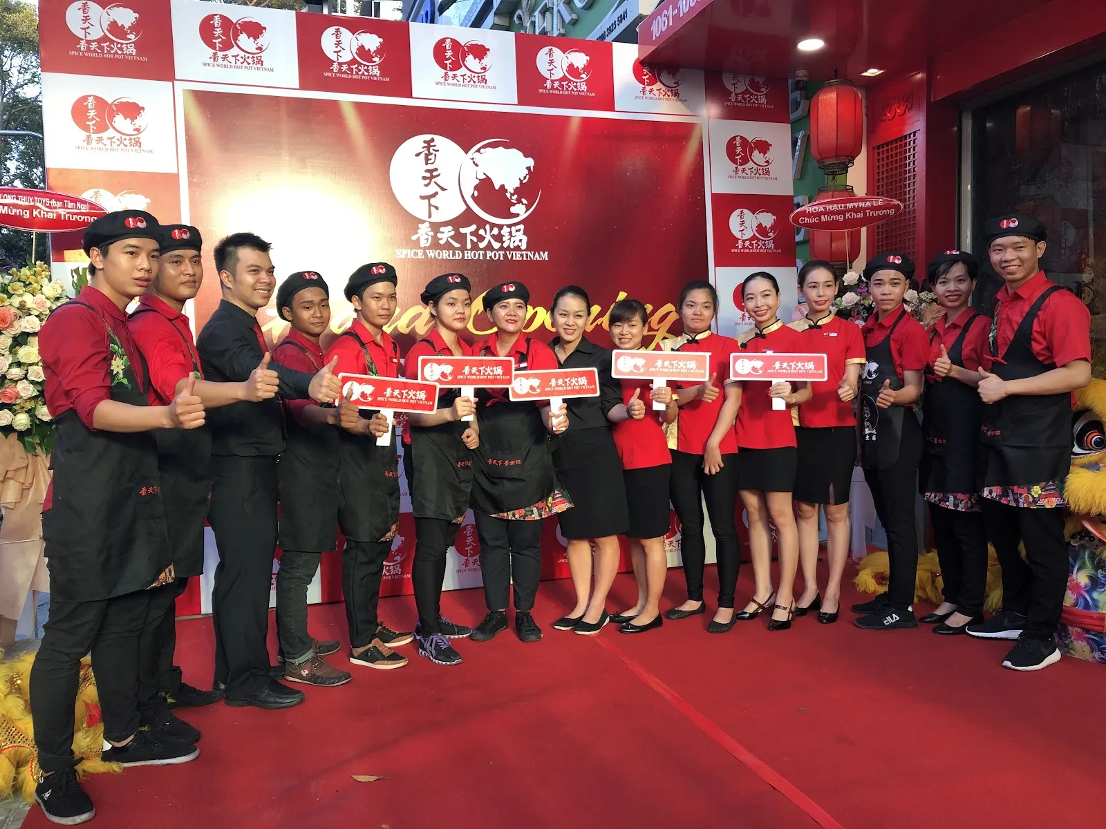 Spice World Hot Pot staff team commemorative photograph on grand opening day