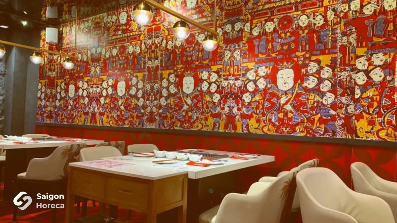 Dining area adorned with vibrant Sichuan folkloric wall murals