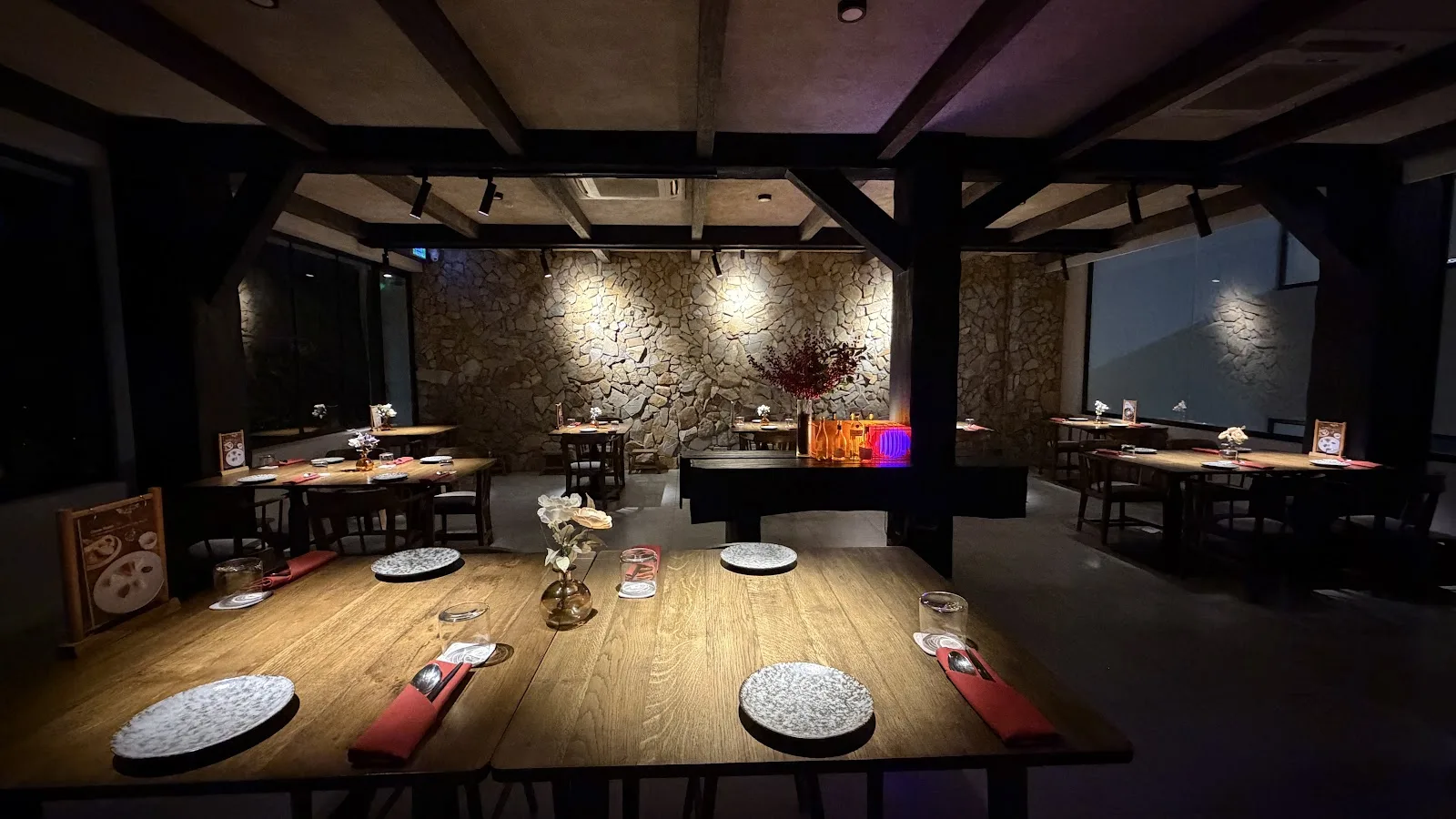 Serene natural stone-walled dining hall at Tales by Chapter