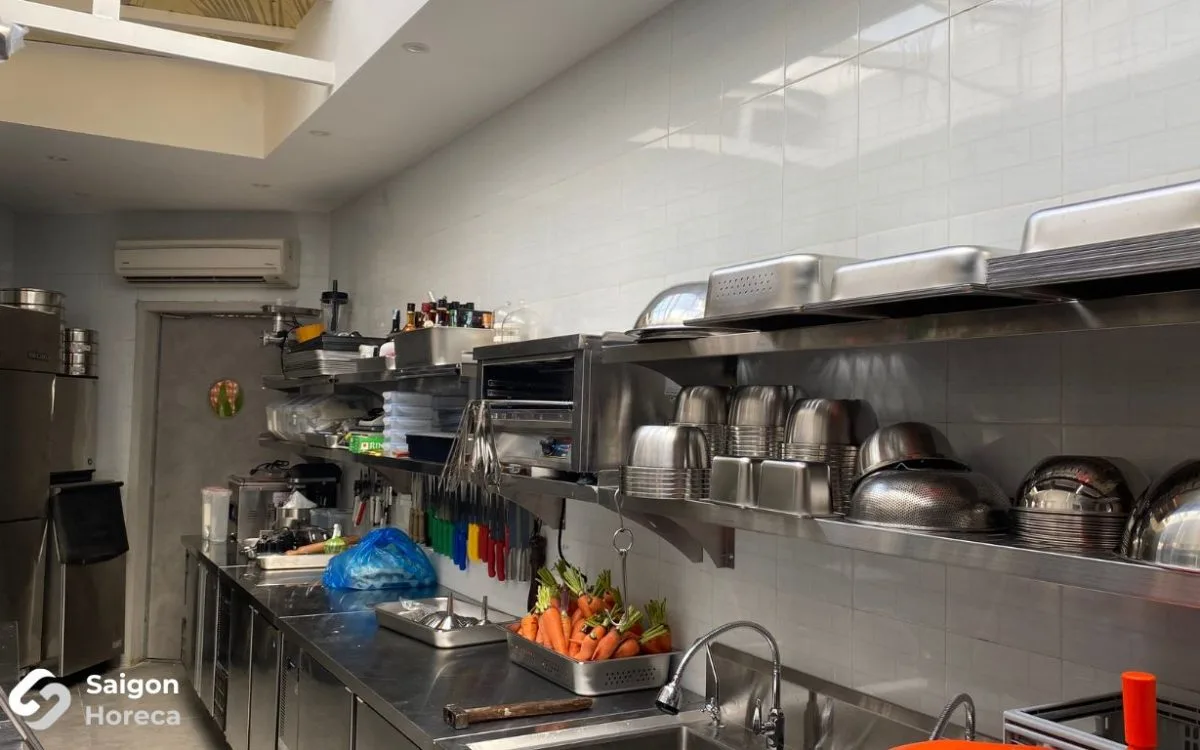 Stainless steel prep table and wash sink at The Brix