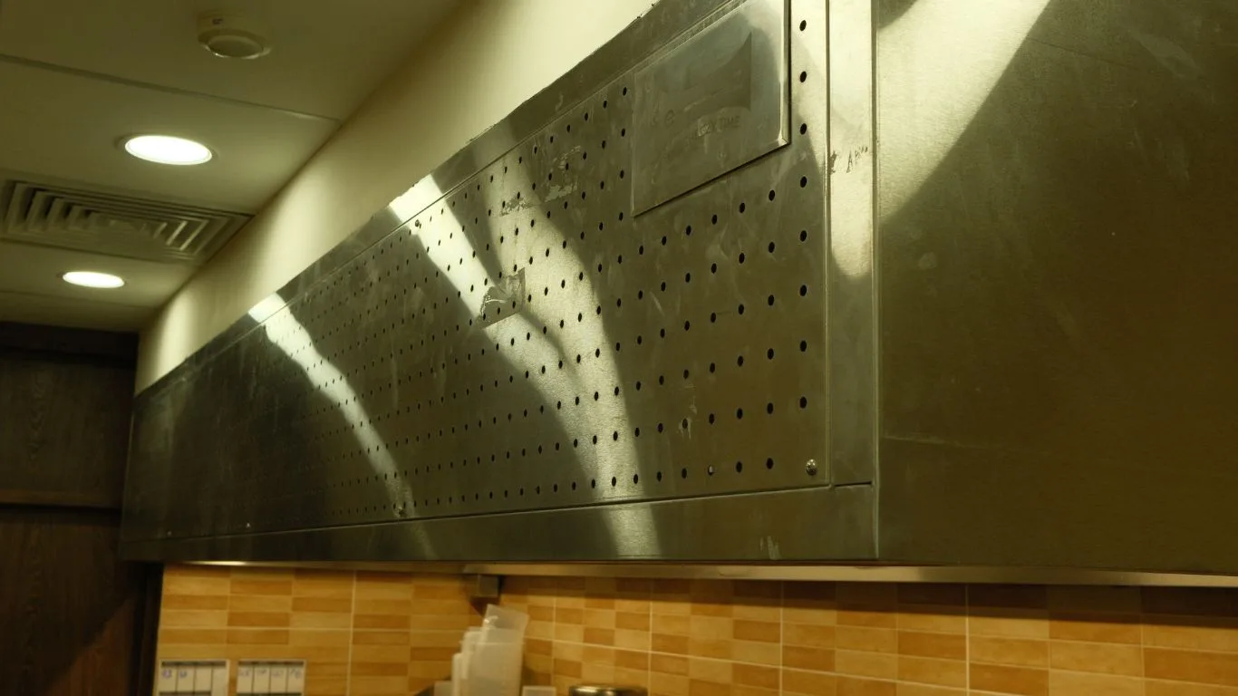 Stainless steel exhaust hood system at The Cheezy Time