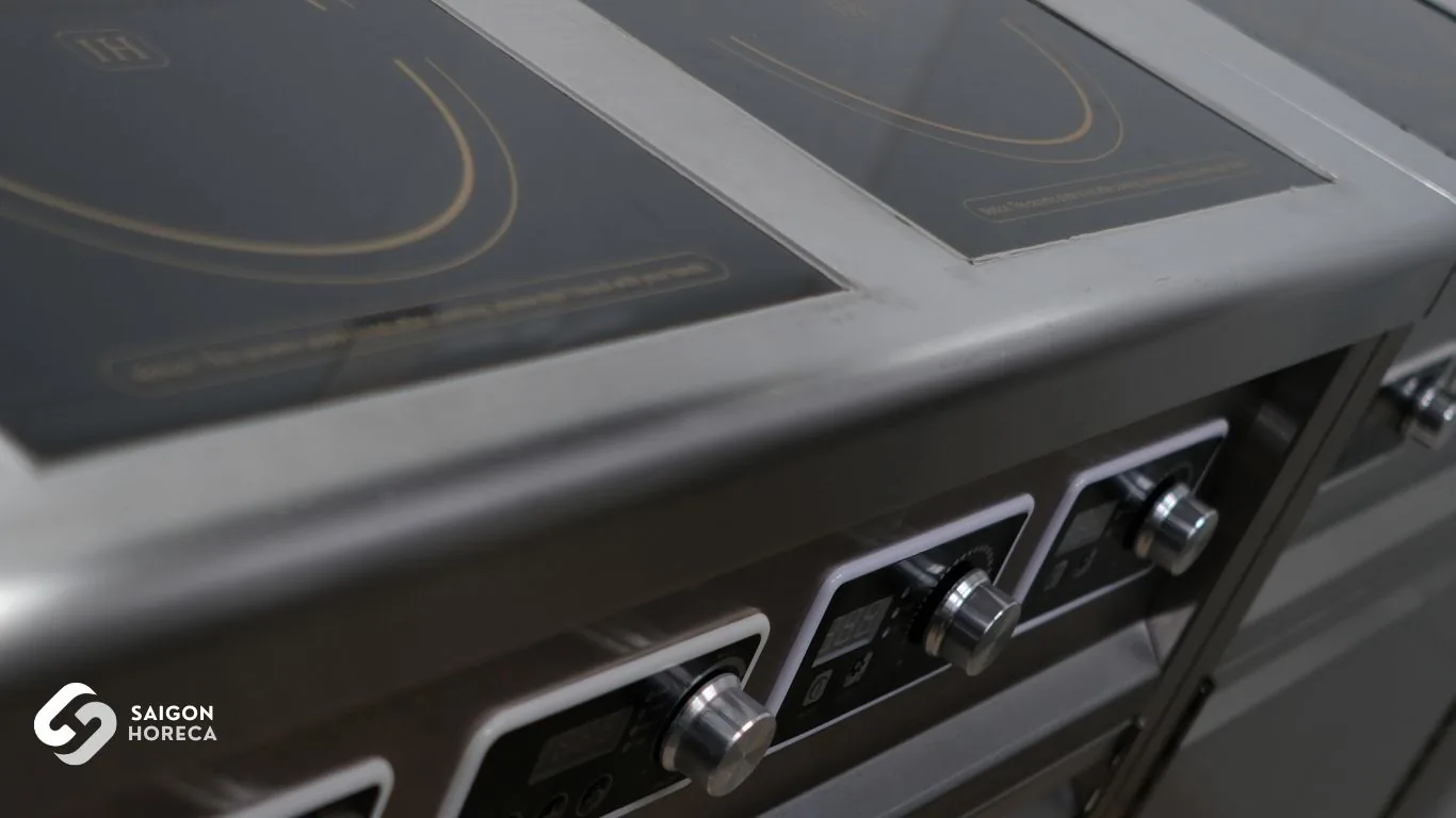 Heavy-duty commercial stainless steel induction range suite at Nam An Senior Living Facility