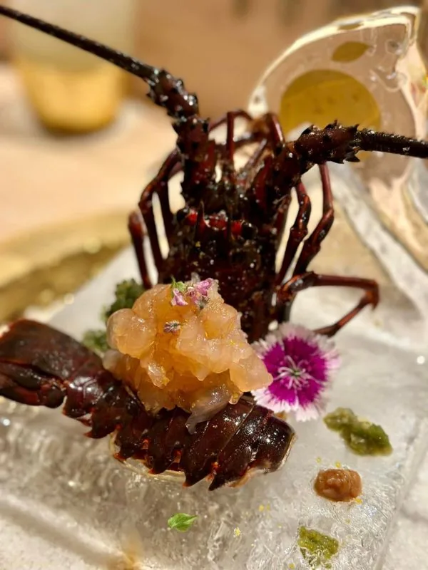 Masterpiece bamboo lobster sashimi presented in pristine whole form